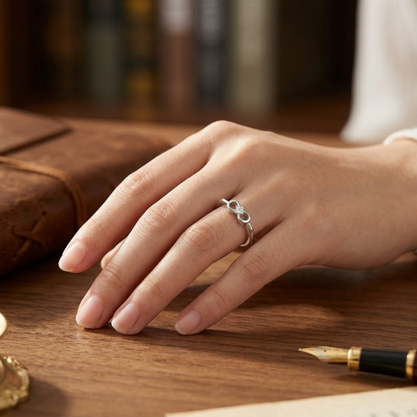 Elegant Infinity Bow Solitaire Ring in 925 Sterling Silver